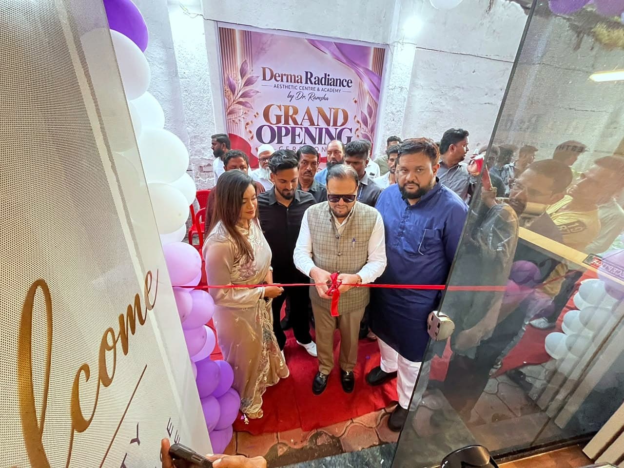 Cutting the ribbon at the grand opening